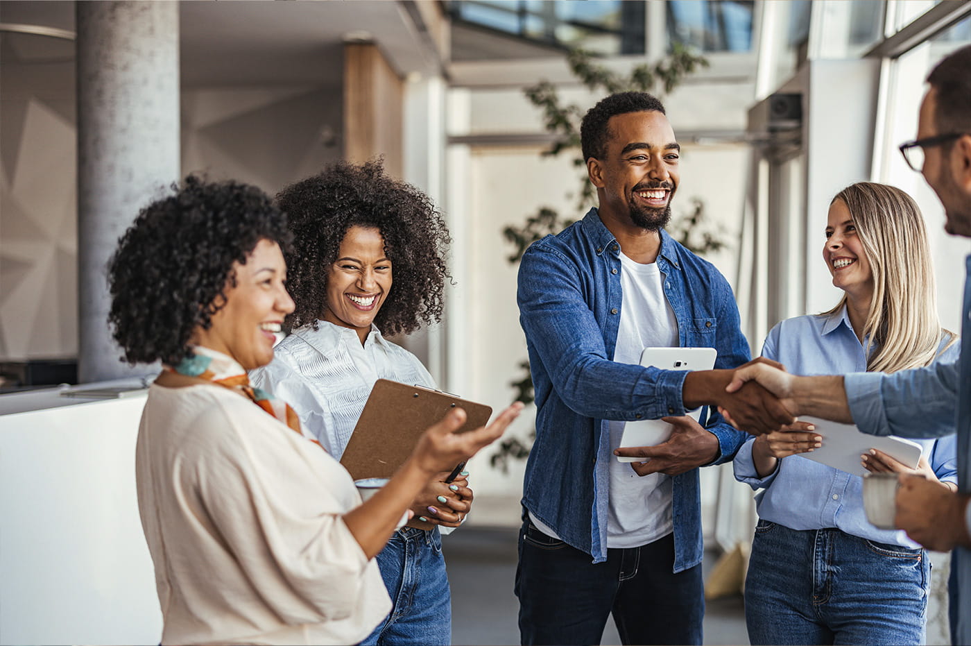 A group of colleagues networking and talking.