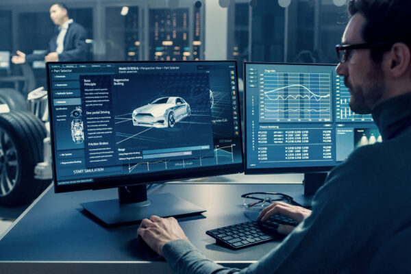 Man looking at a car on a screen