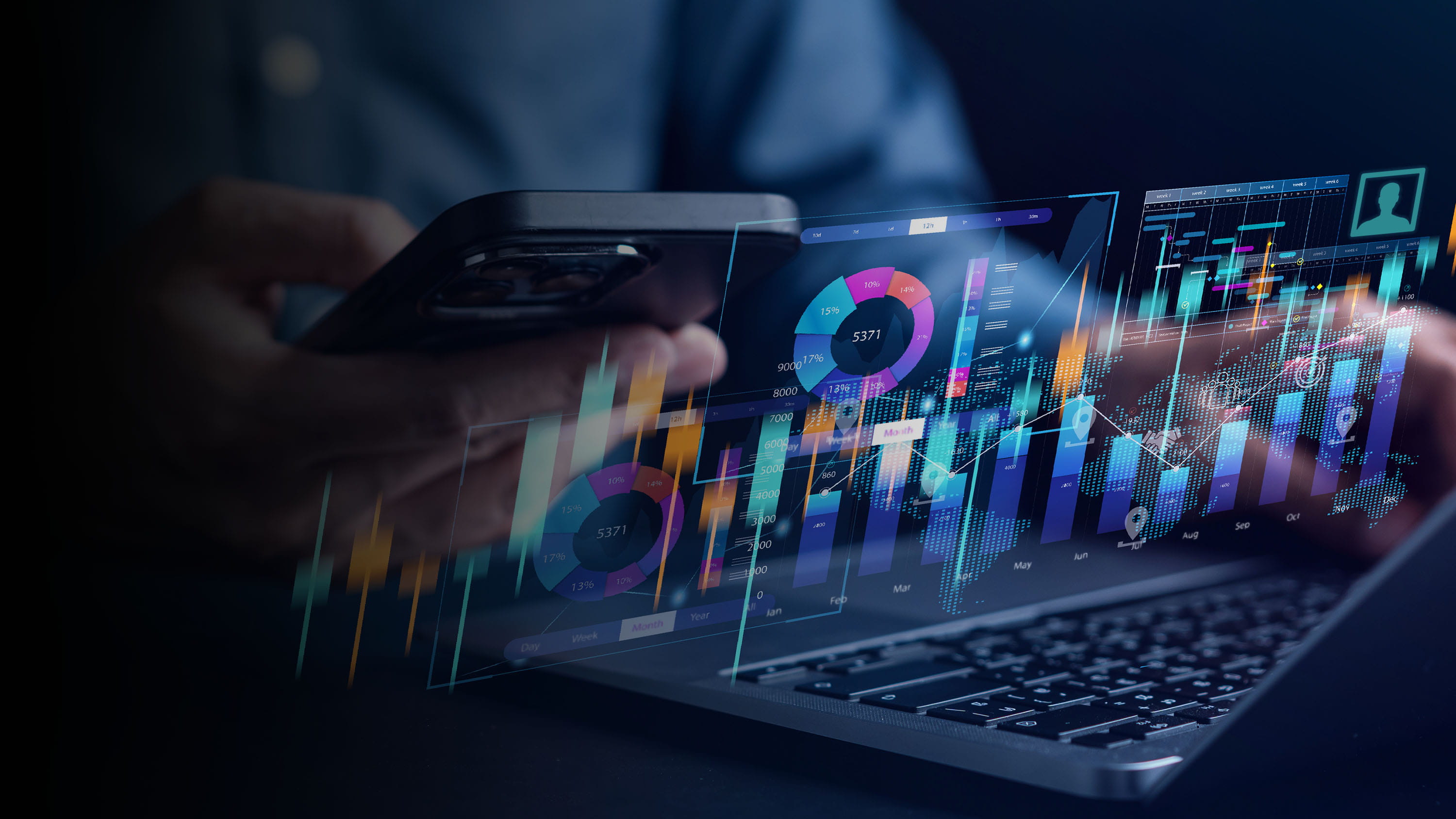 Holographic data floating above a laptop.