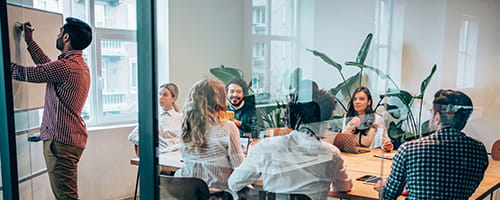 A group of coworkers in a brainstorming meeting.