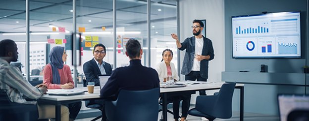 Several coworkers in a meeting discussing data