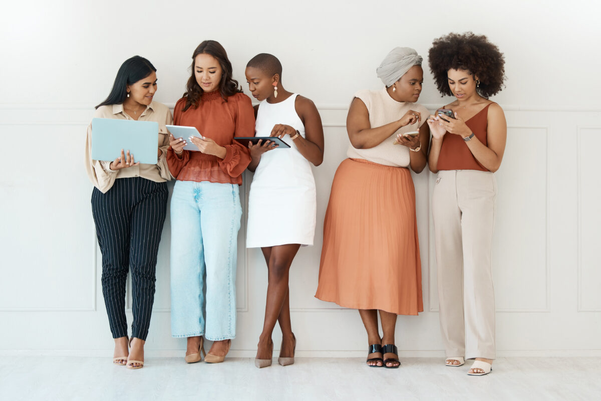 A diverse group of women talking.
