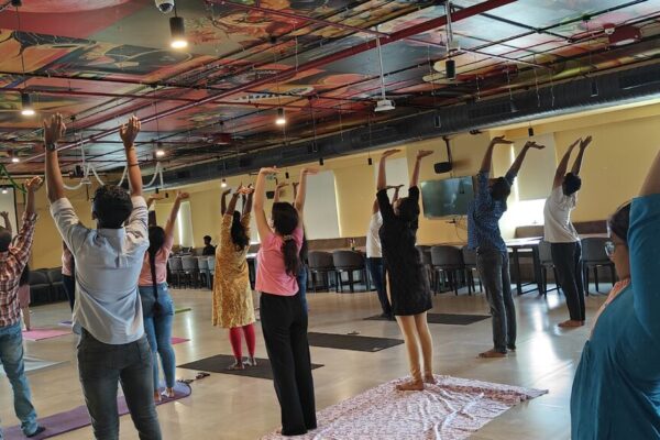 Chennai colleagues taking a yoga class together