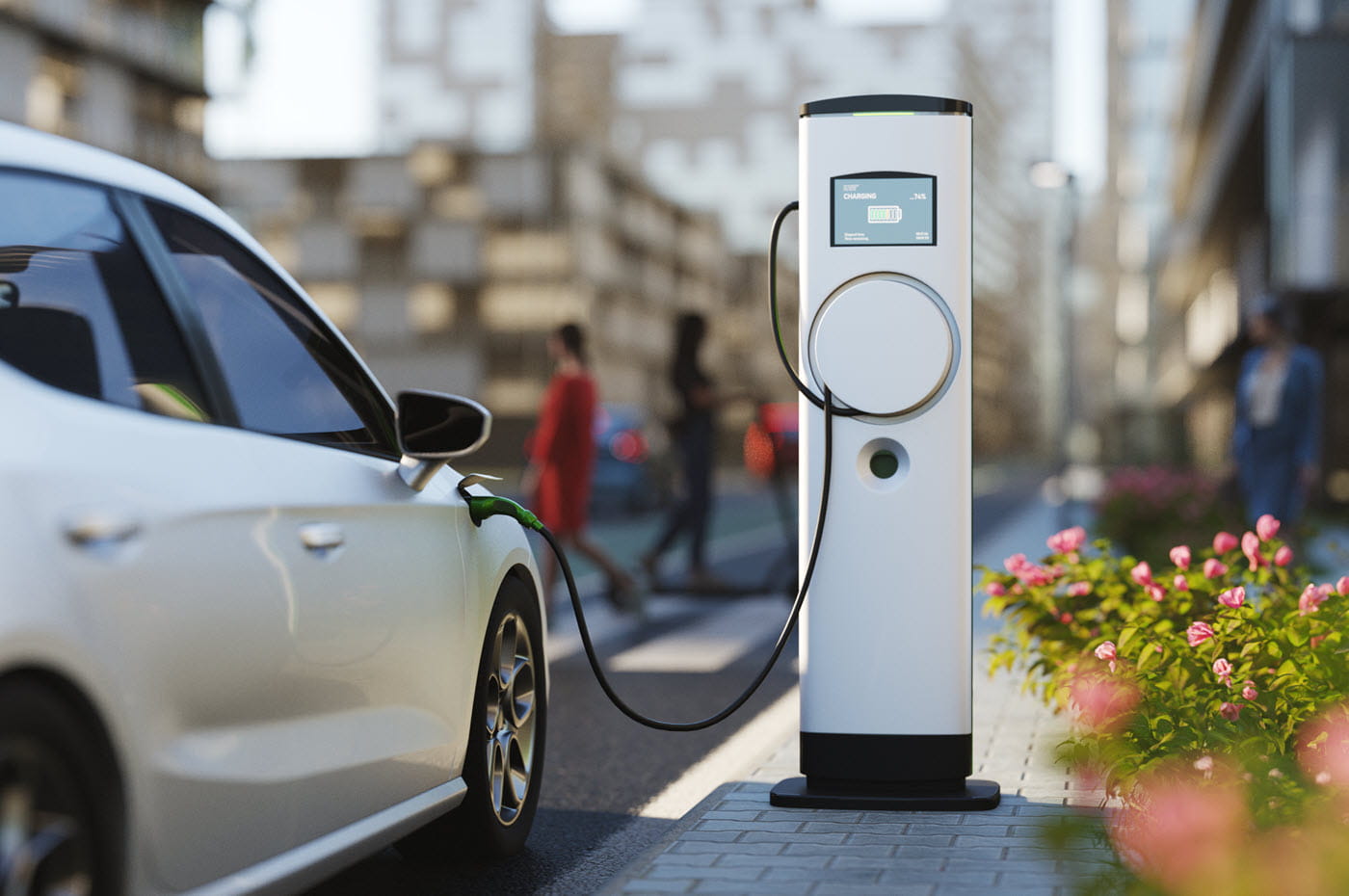 An electric car (EV) plugged in at a charging station.