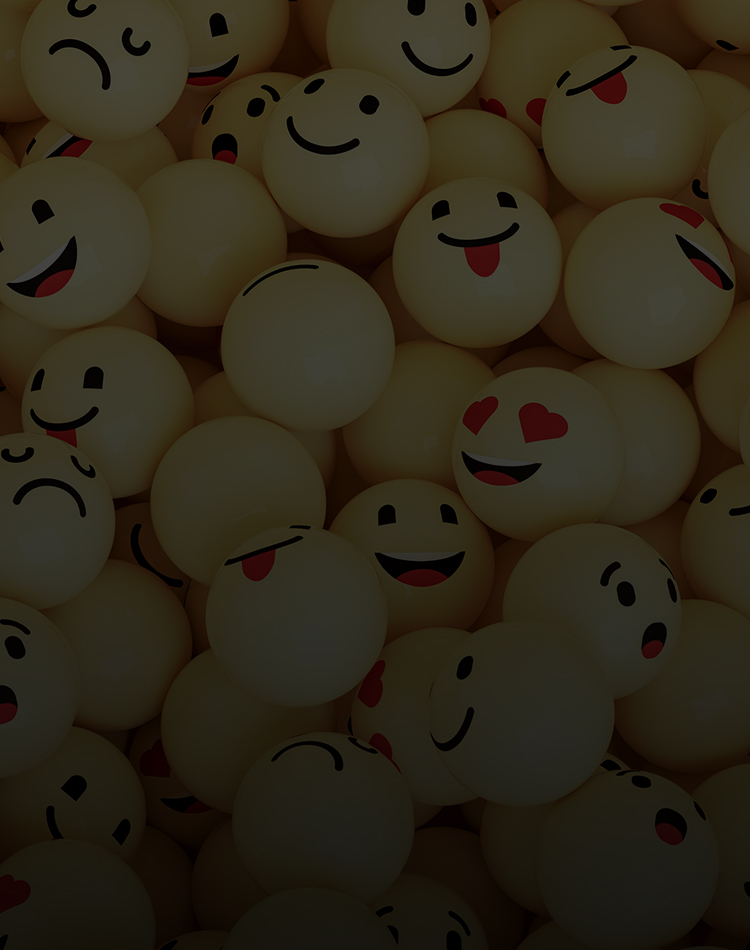 Bouncy balls decorated with different smiley faces, mobile hero.