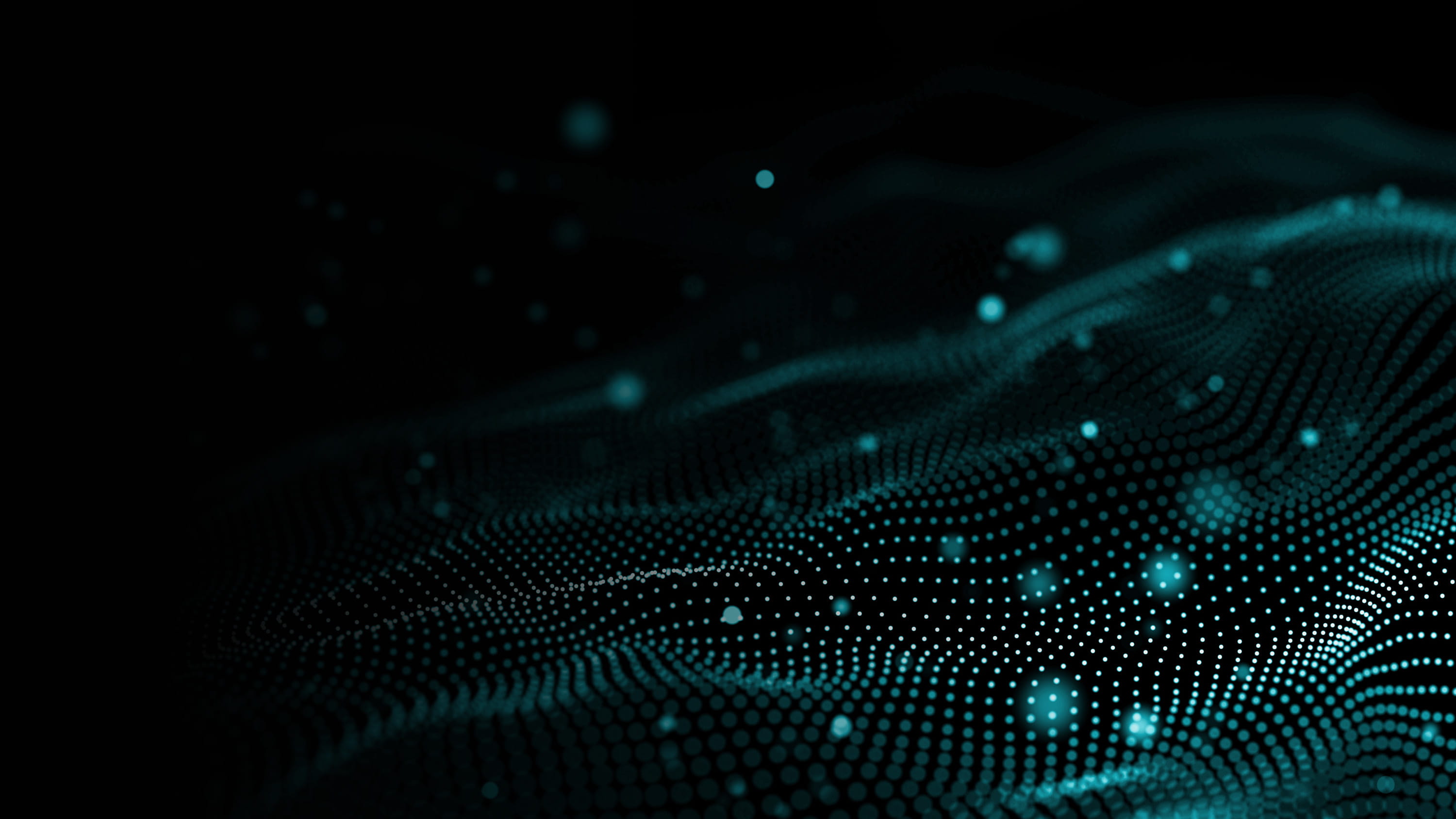 Blue-green gradient glowing datawaves on black background.