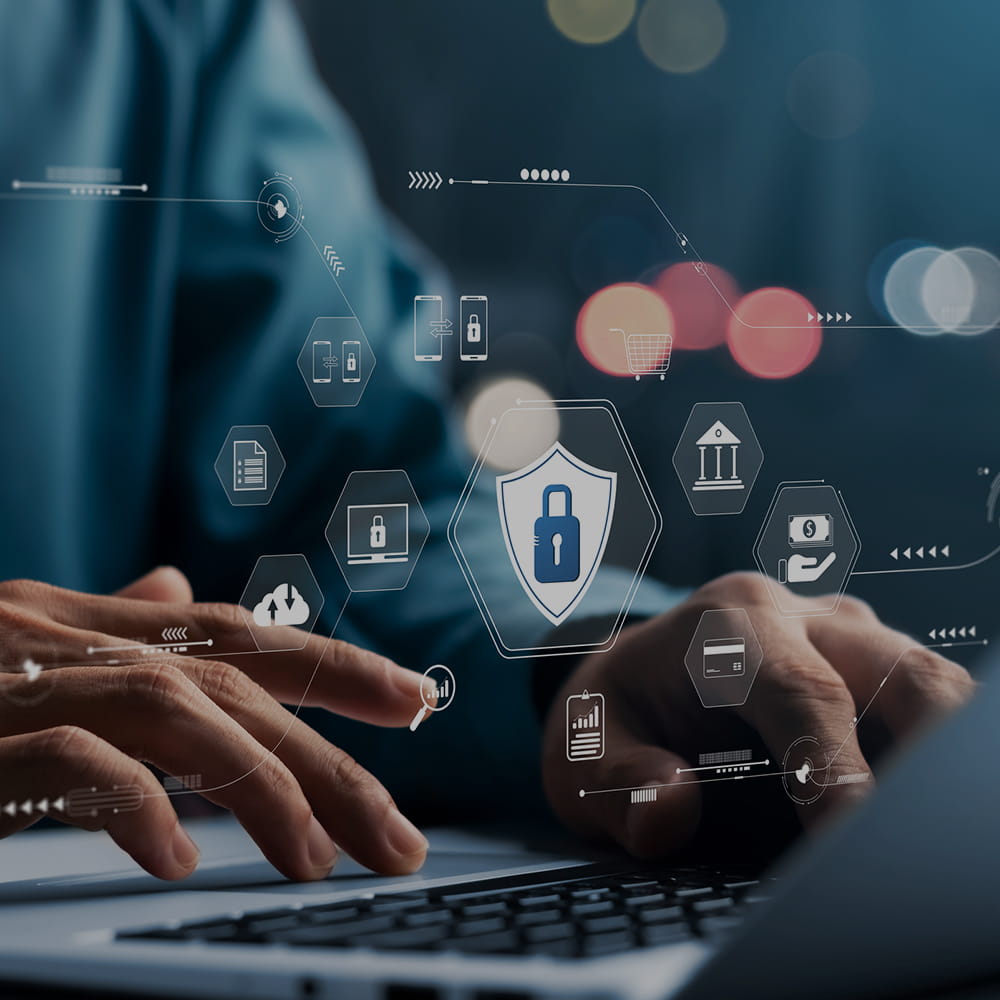 Using a laptop with digital symbols above it