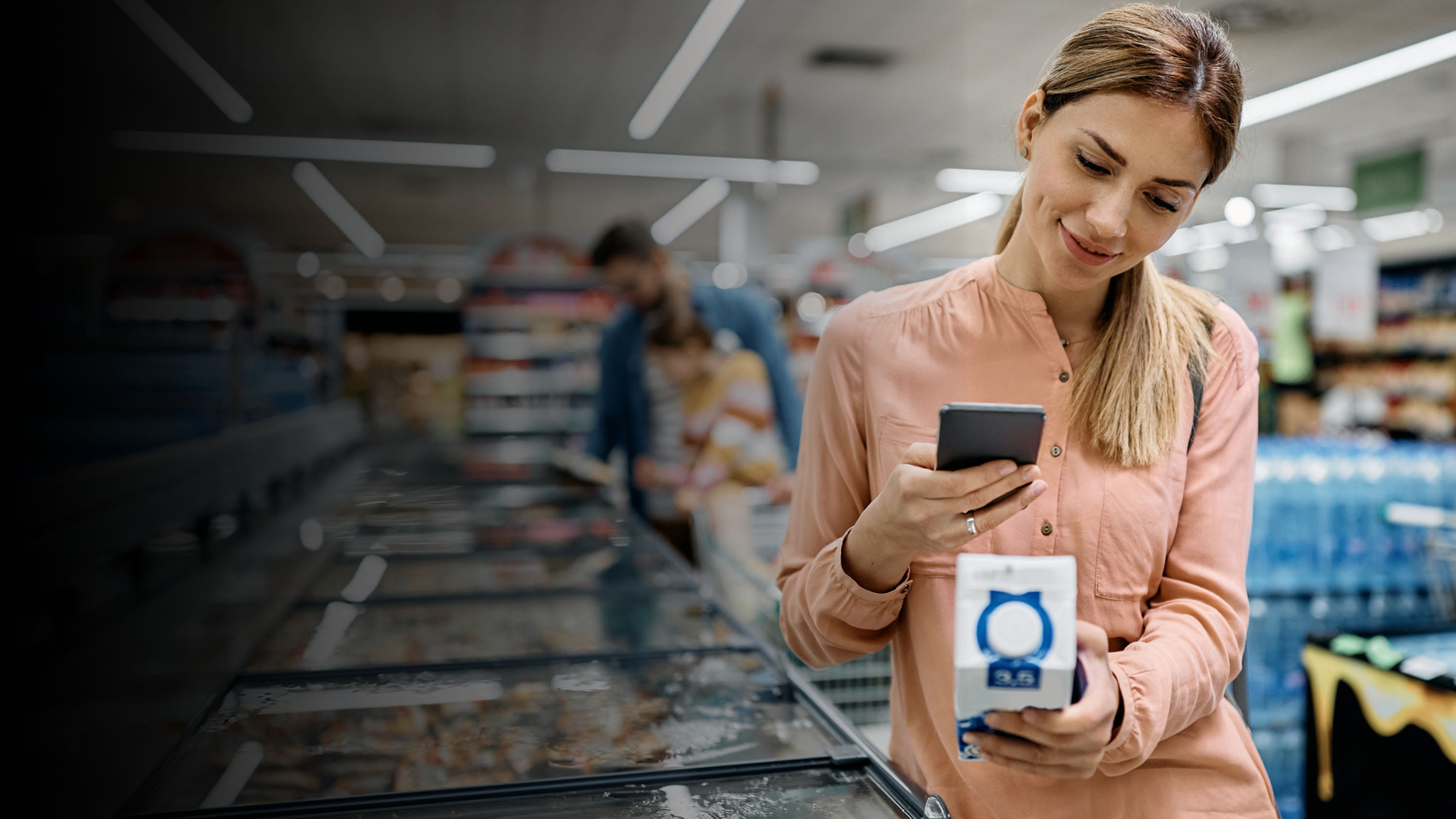 A woman grocery shopping.