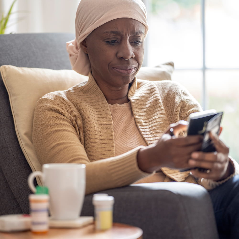 Woman sitting in chair on the phone