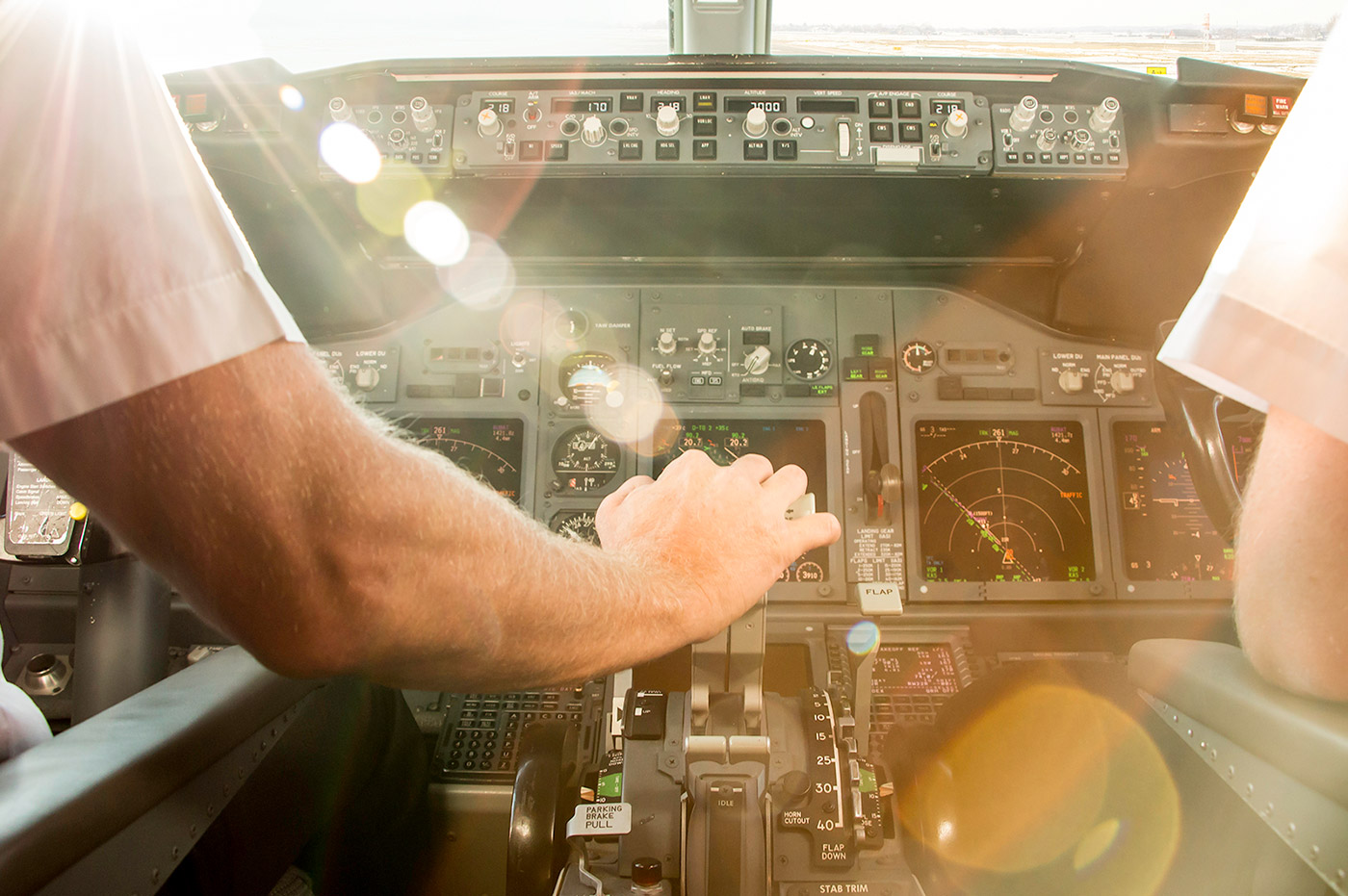 Airplane control panel in cockpit of plane.