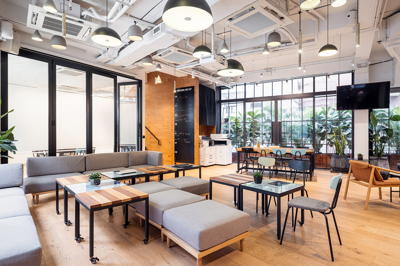 Large open workspace filled with furniture.