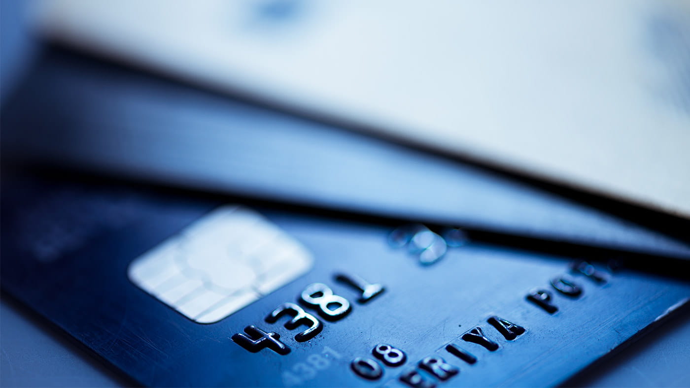 Close up image of a stack of credit cards.