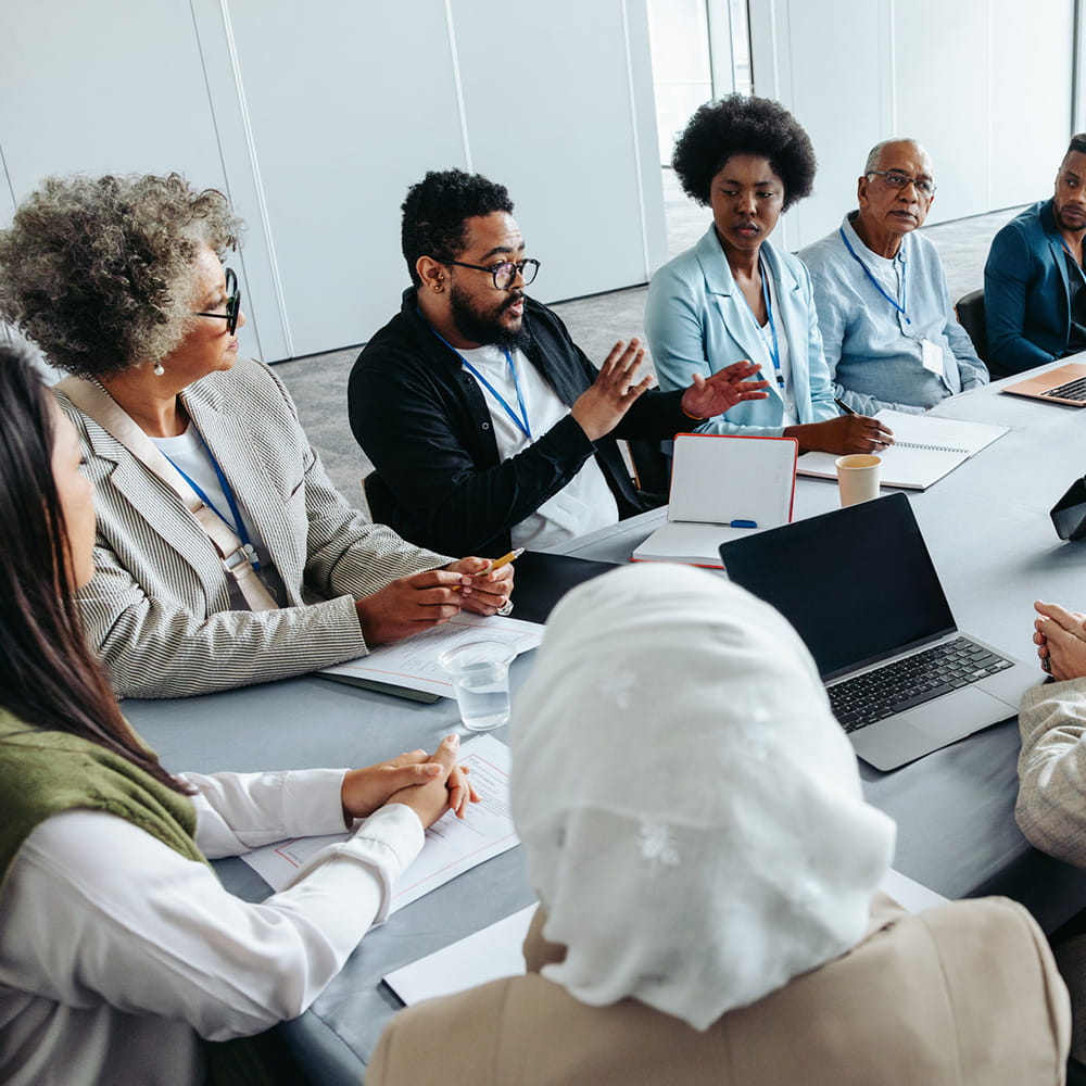 Colleagues sitting in a meeting.