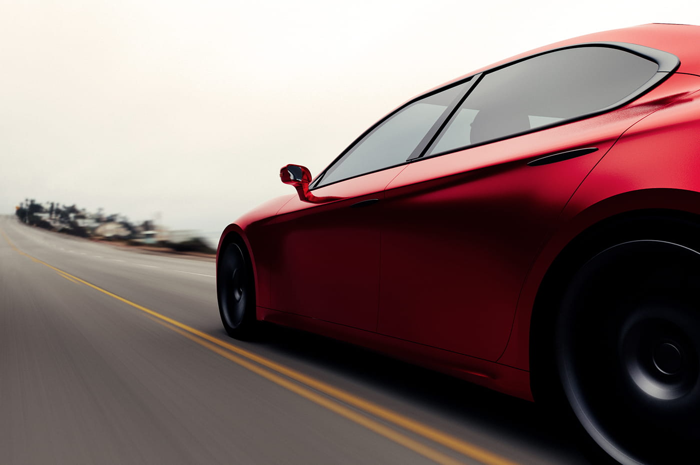 Red car quickly driving down a road.