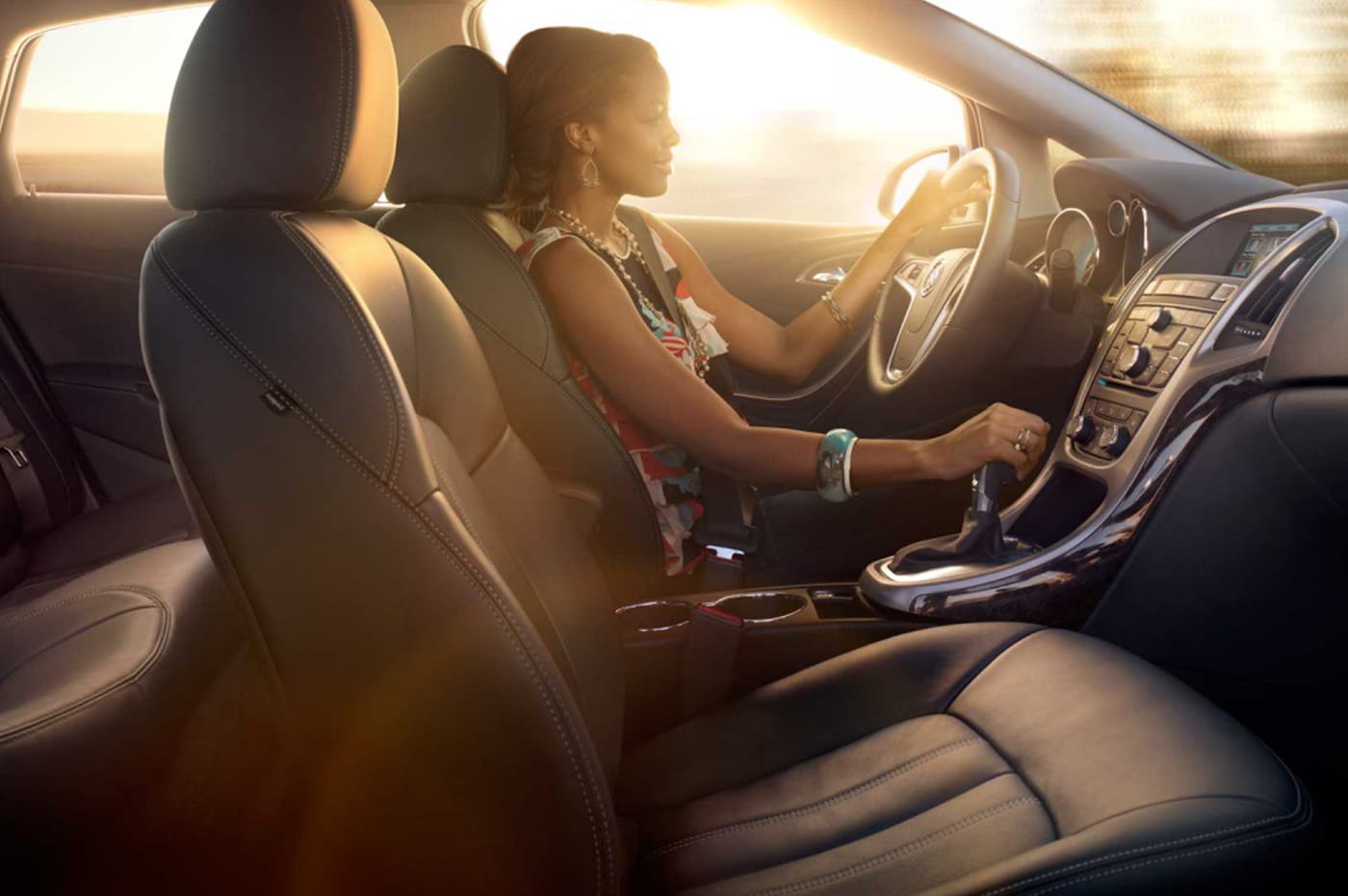 A woman driving a car. 