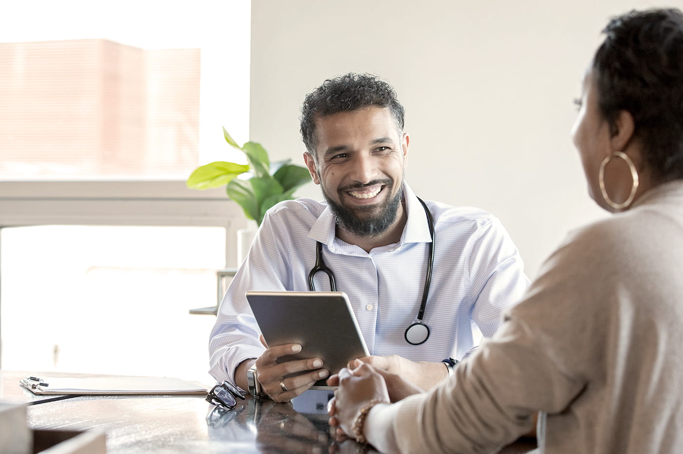 A doctor talking to his patient.