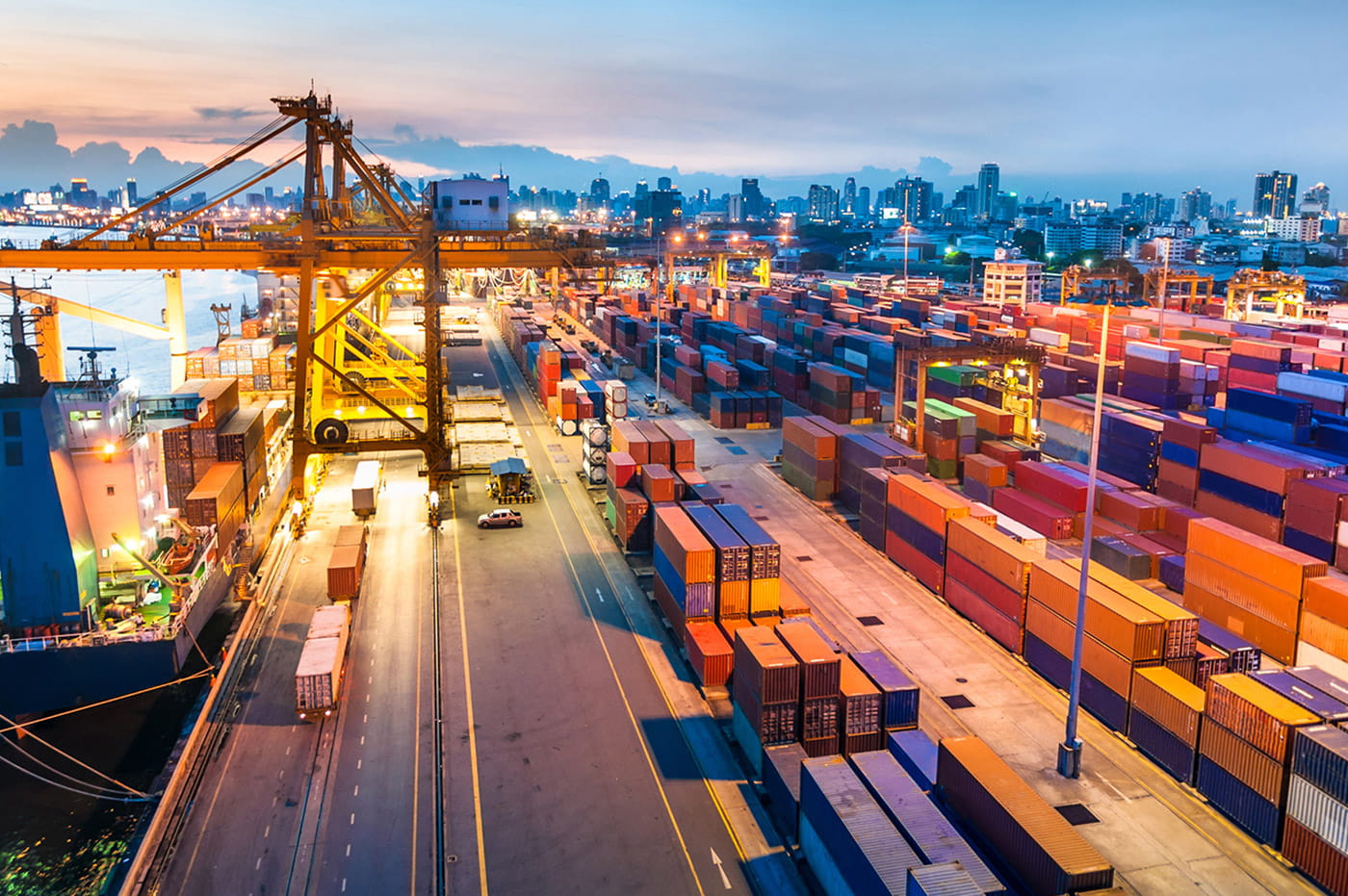 An outdoor shipping yard filled with large storage units.