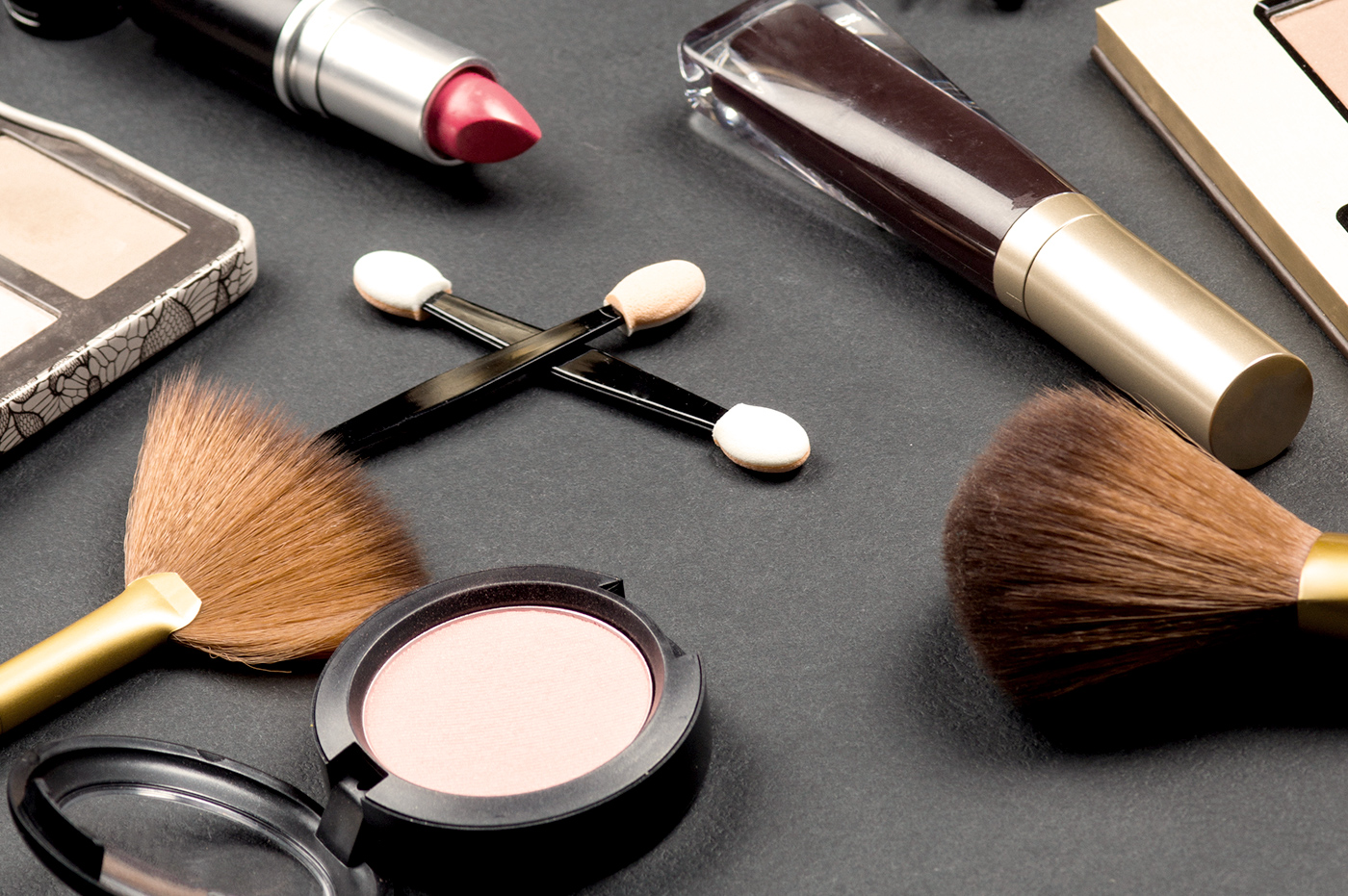 Various makeup tools and products.