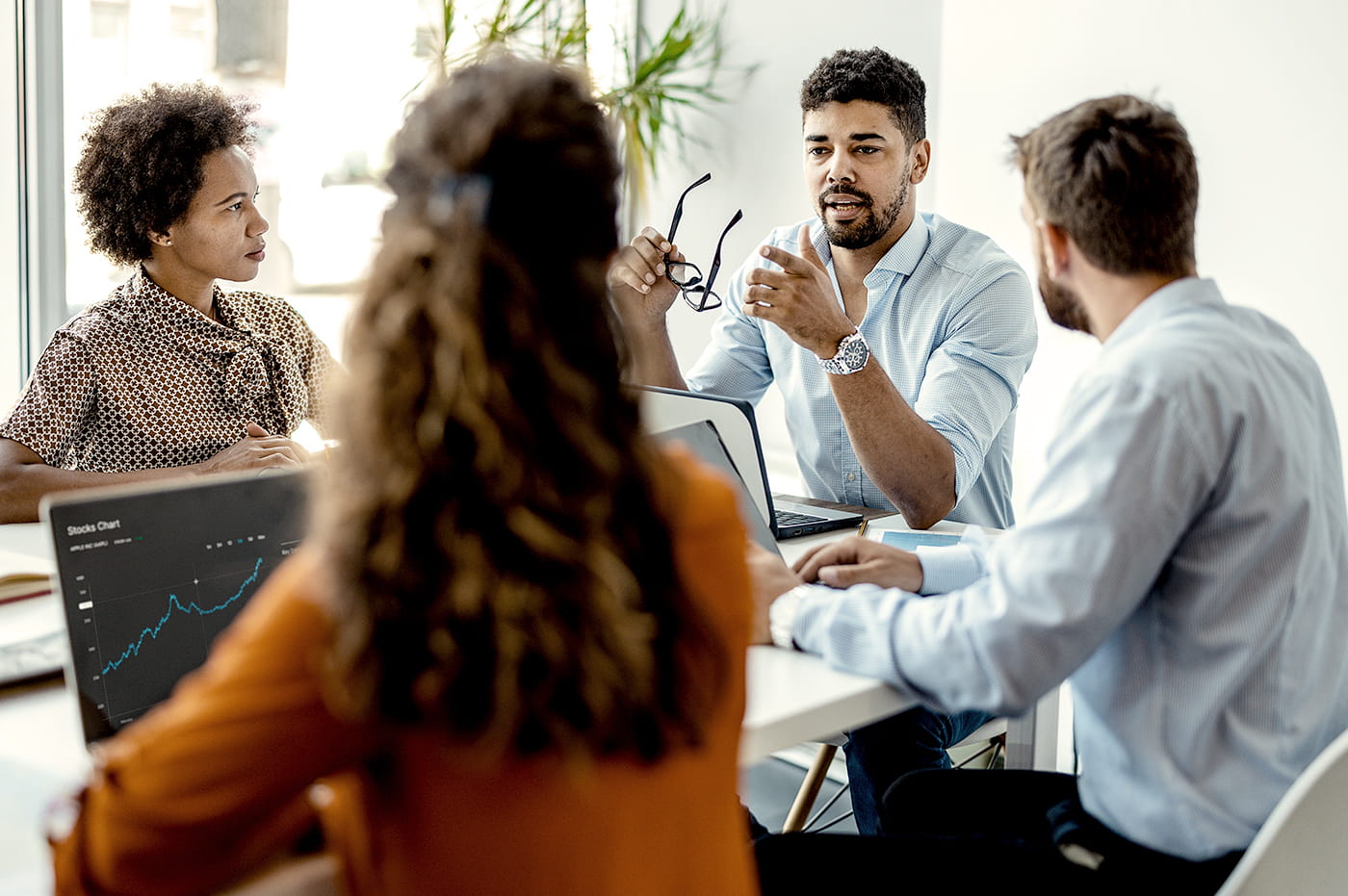 Businessmen and woman in a meeting