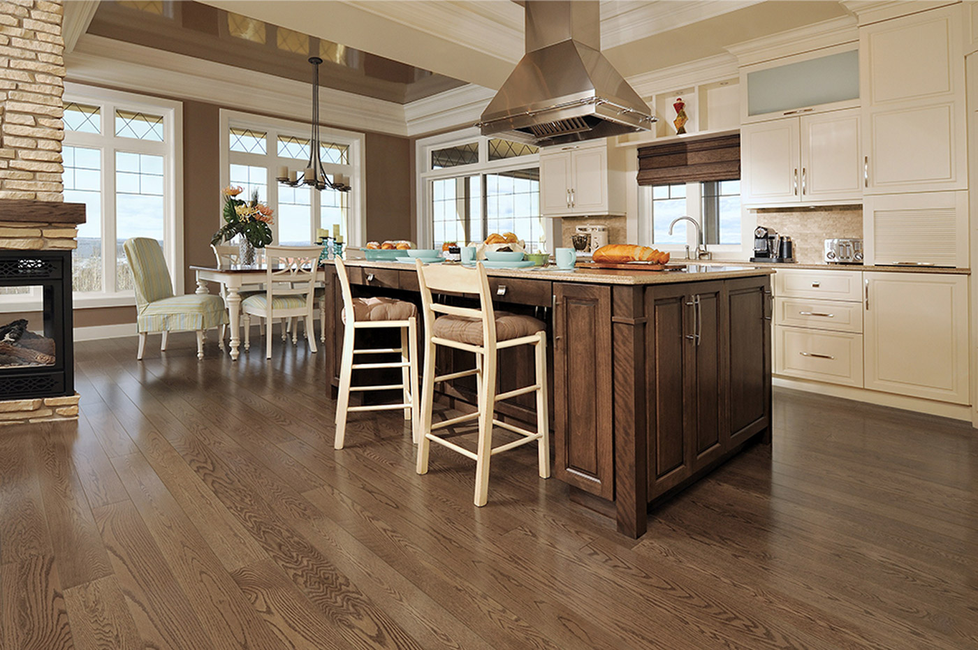 A brown kitchen with an island.