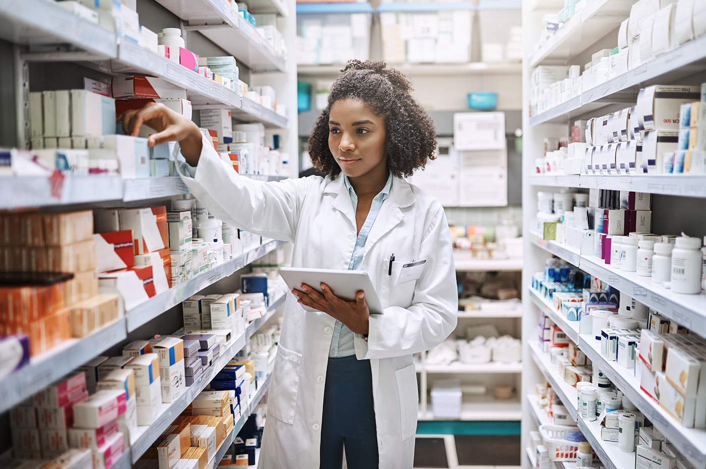 Healthcare worker picking out a Prescription