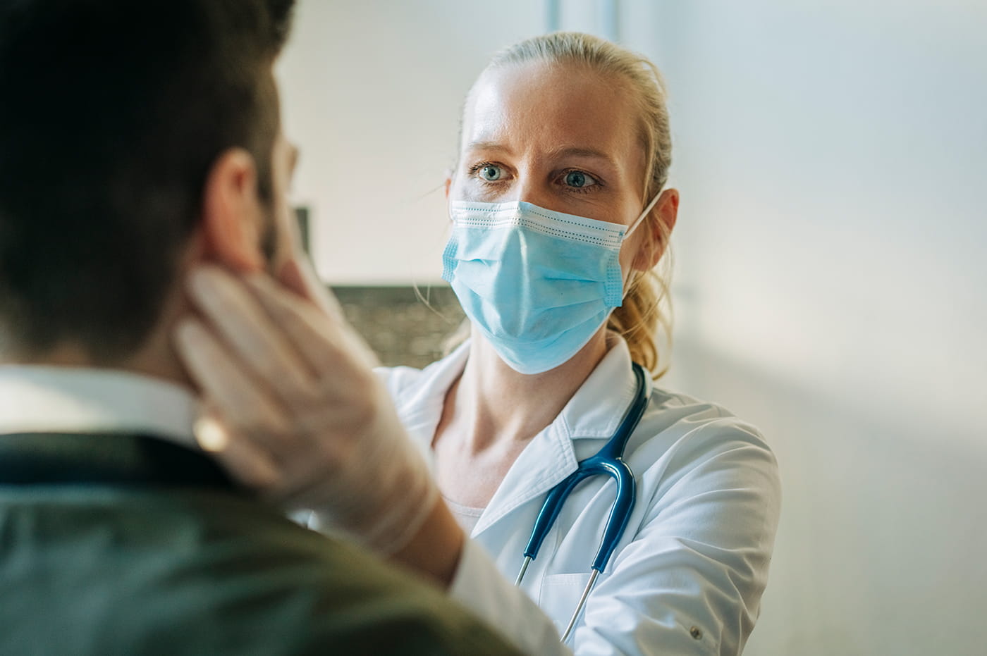 A doctor doing a checkup with a patient. 