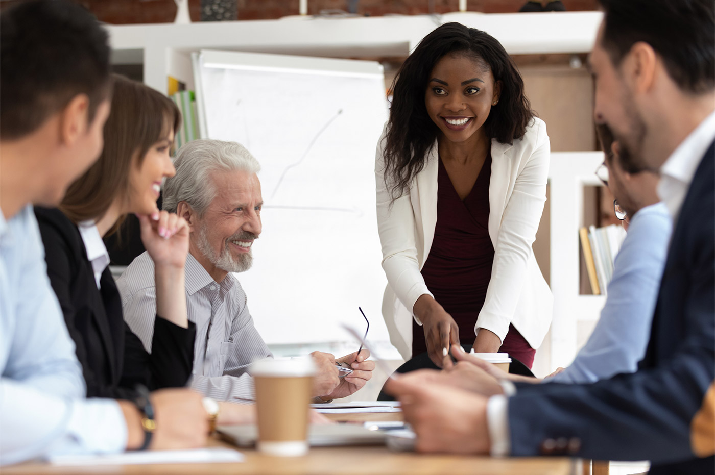 A group of professionals having a meeting in a conference room.