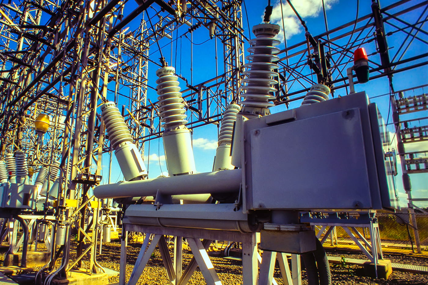 An intersection of power wires and an energy box at a powerplant.