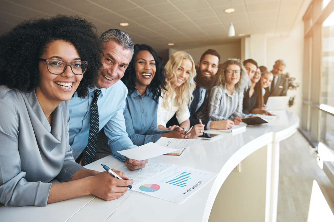 A bunch of smiling coworkers.