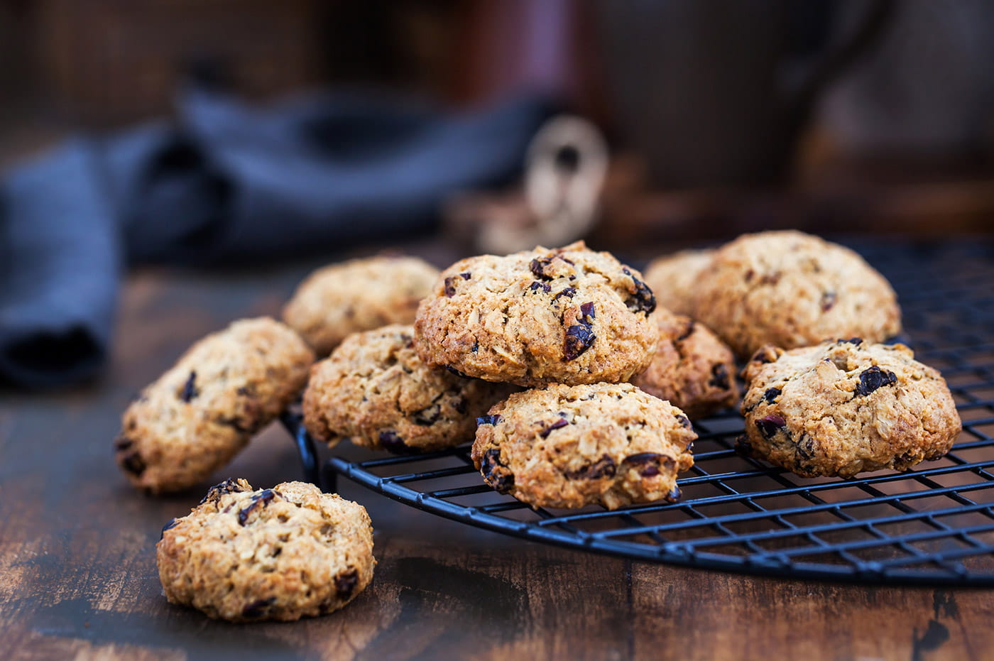 Oatmeal raisin cookies on a cooling tray.