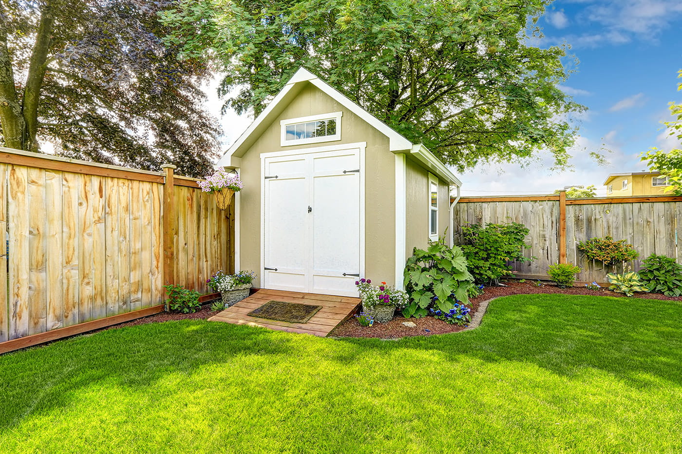 A shed sitting in a garden.