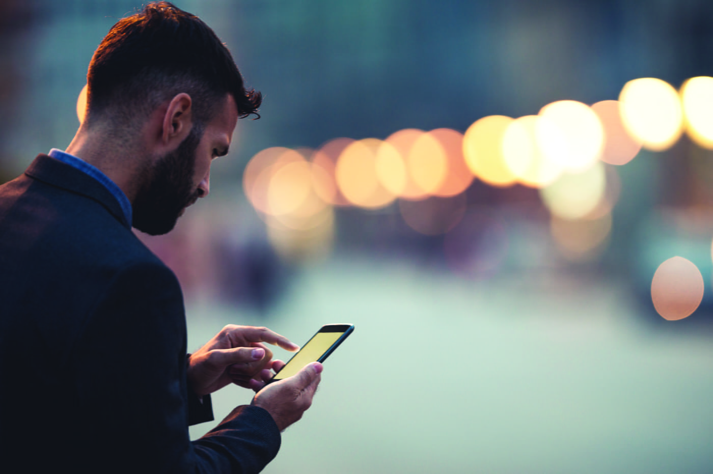 A man using a cellphone.