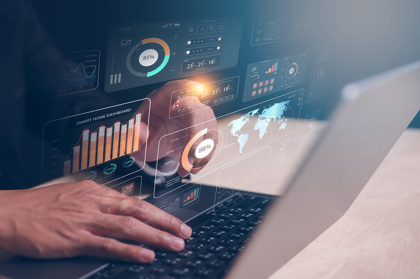 Person typing on a laptop with girds floating over it