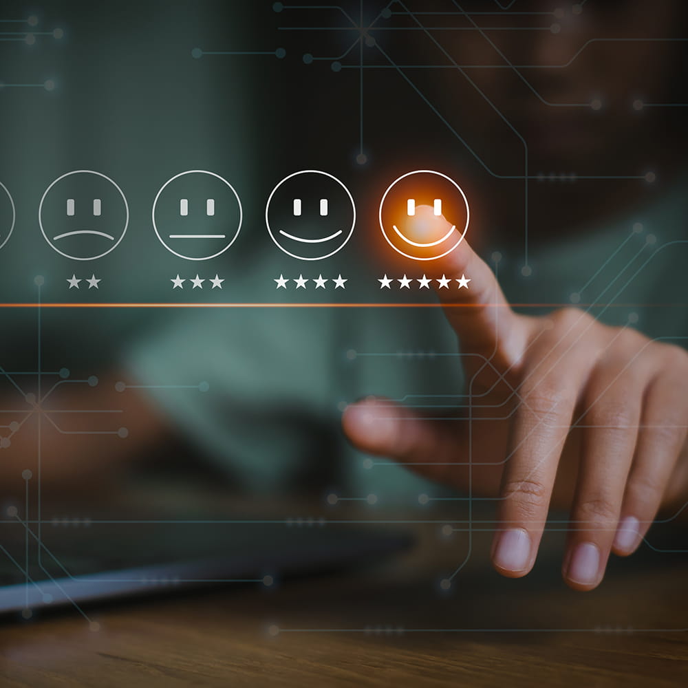 A person touching virtual faces with different emotions and ratings