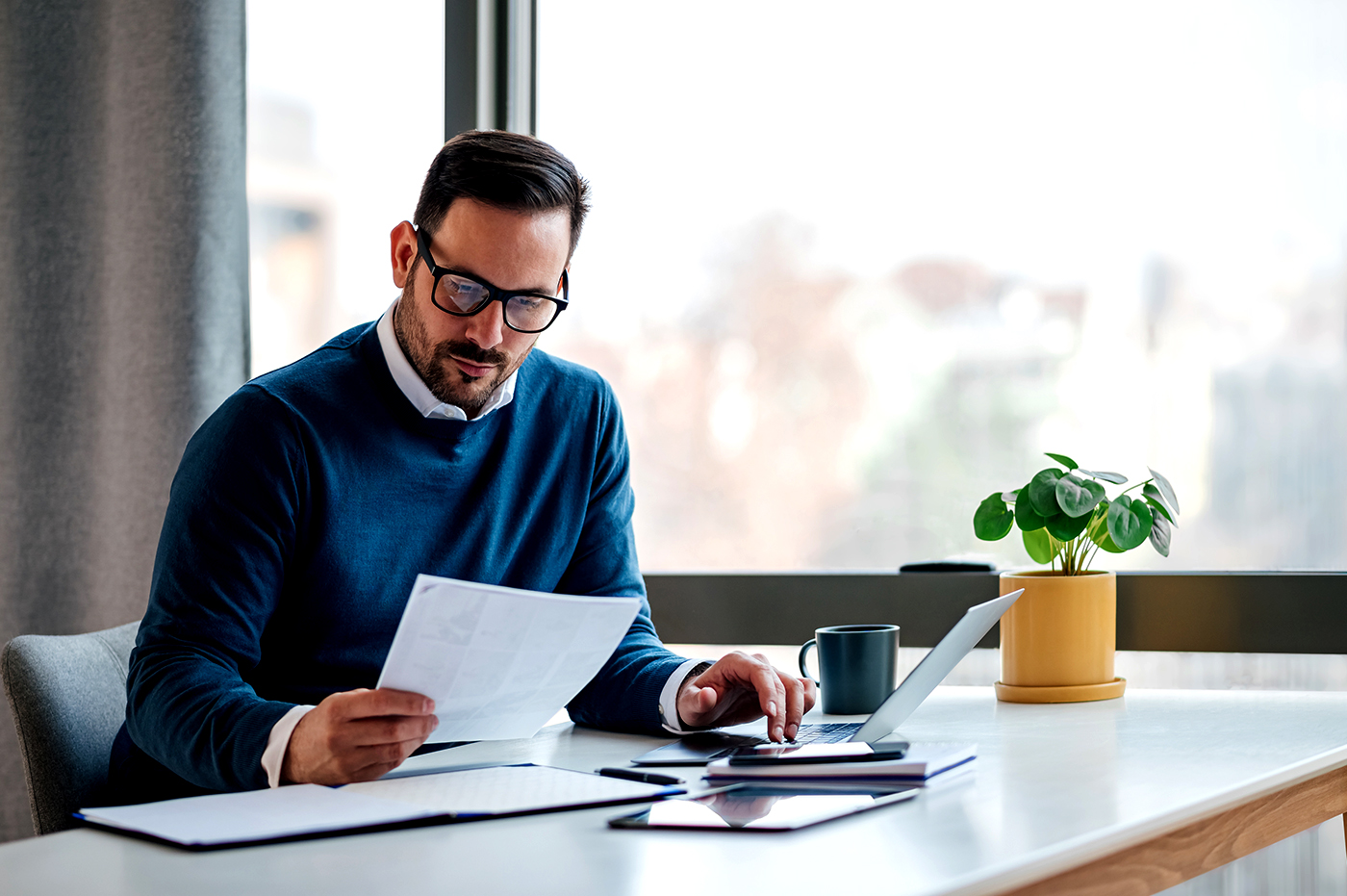 A man working on paperwork.