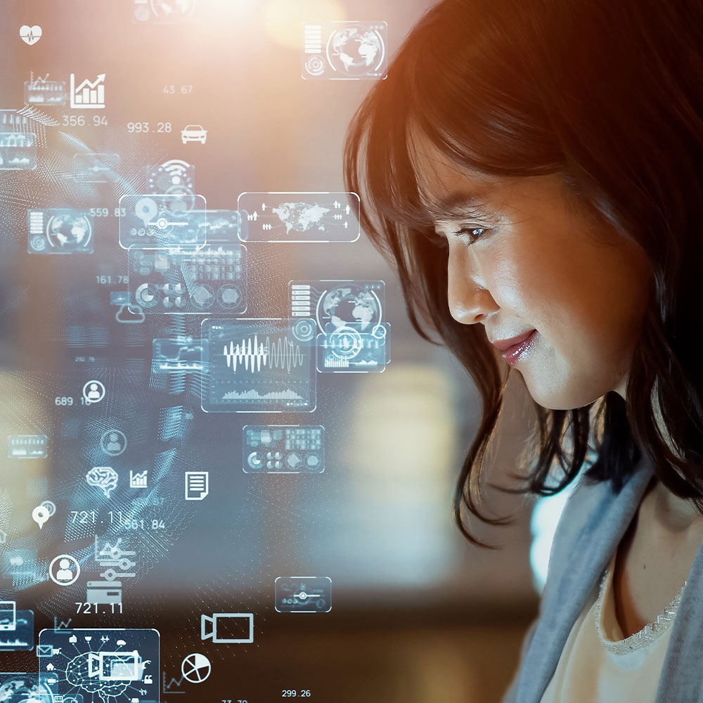 A woman using a device surrounded by multiple glowing images of the internet.