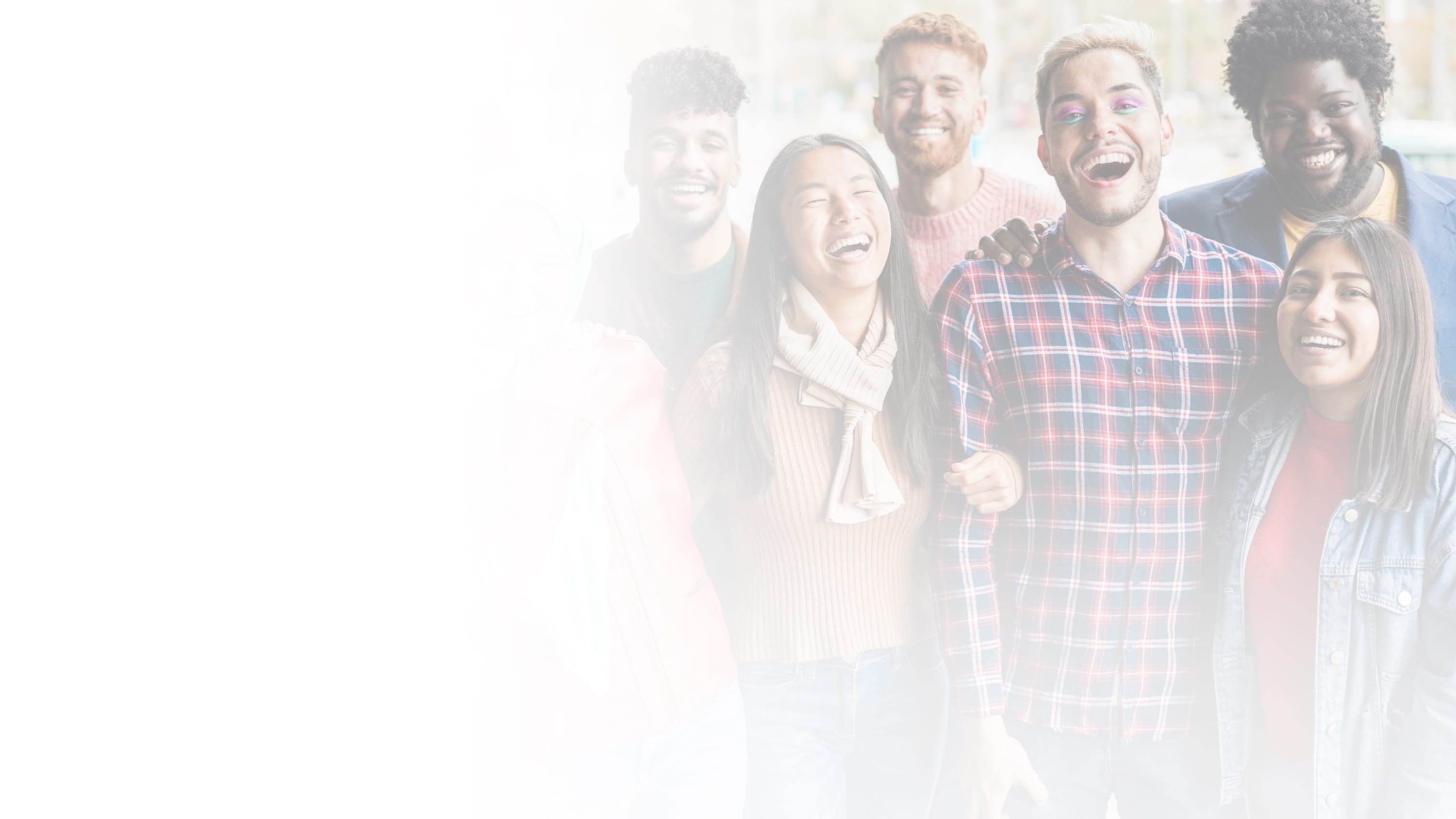 group of people posting and laughing