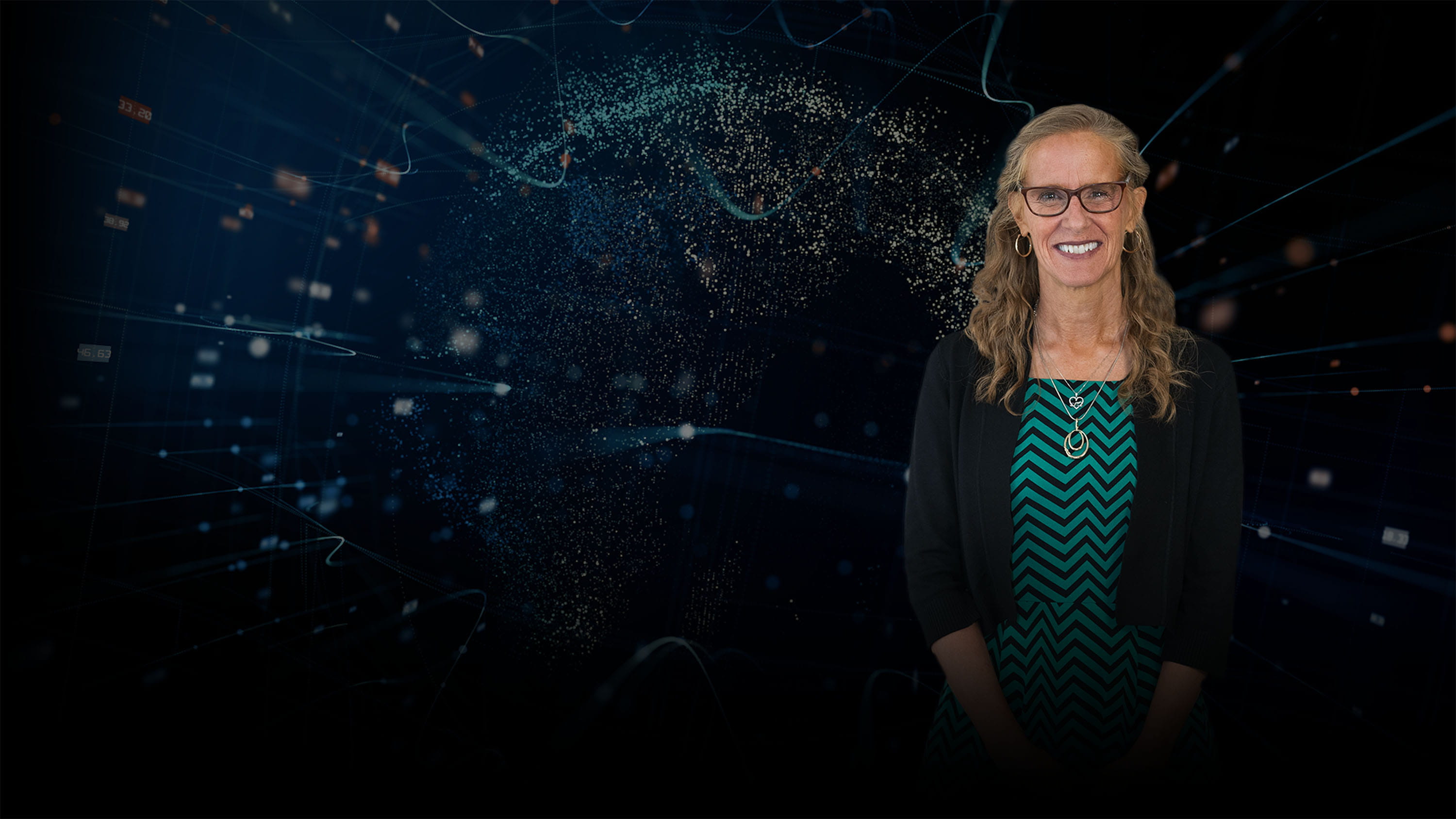 Mary Beth Ostasz in front of an abstract