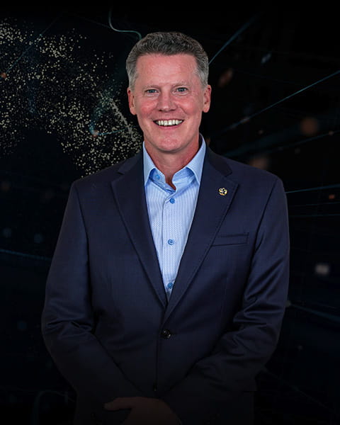 Perficient AVP Denis Murphy on abstract background.