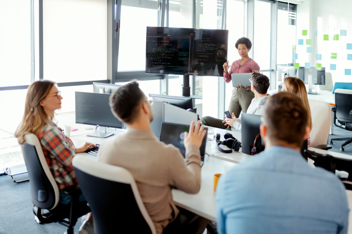 Businessmen and women in a meeting.