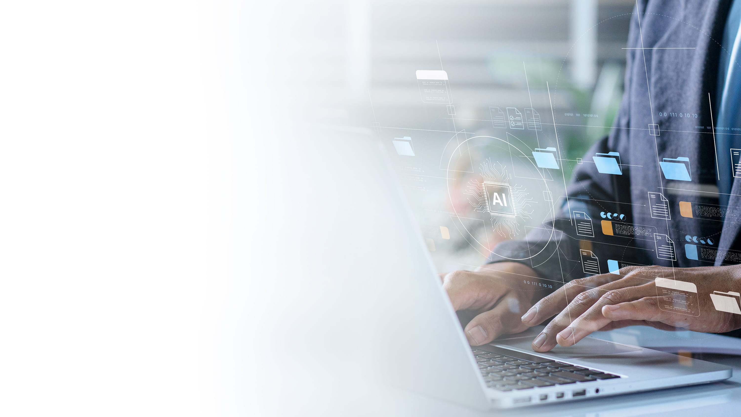 Person on a laptop with folders floating above laptop