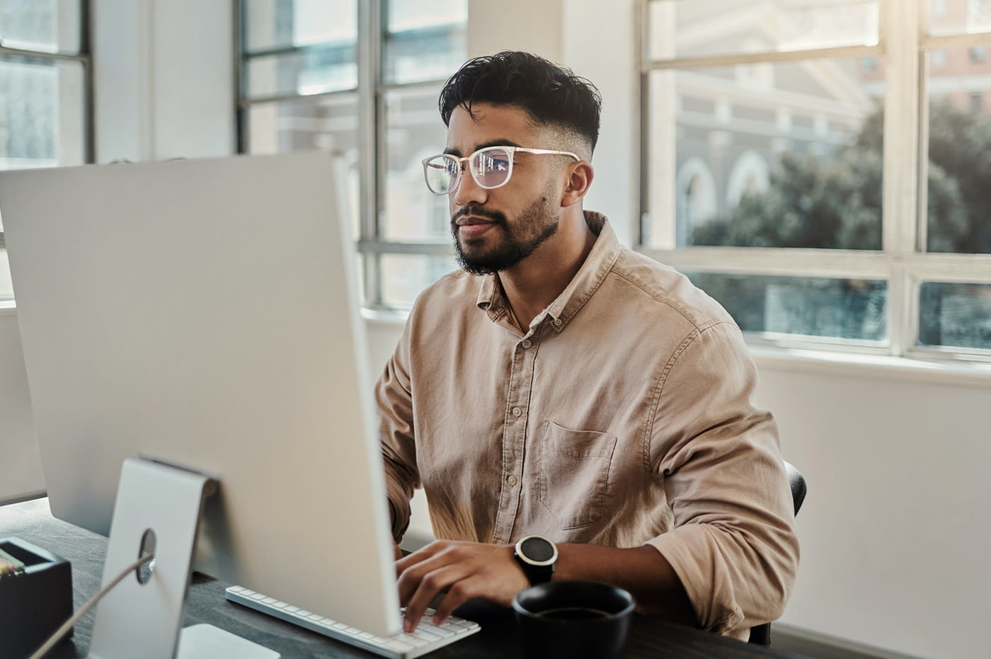 Young man working on a computer.