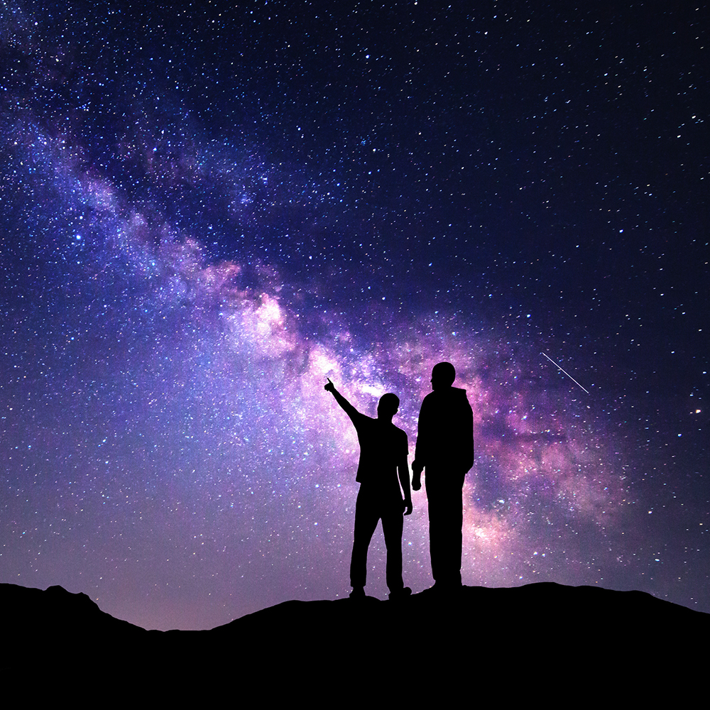 Two people stargazing.