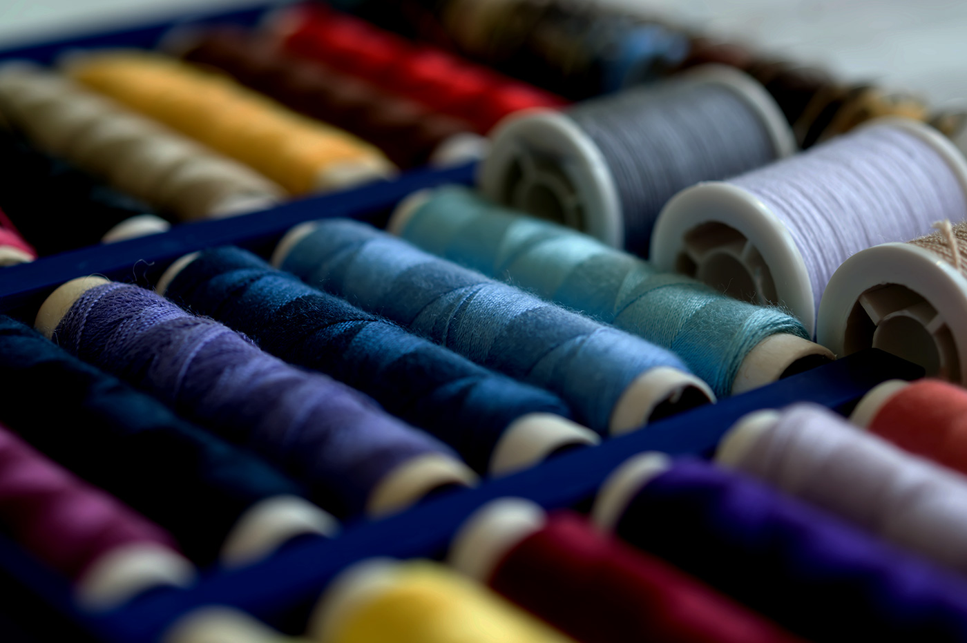 Spools of thread in various colors.
